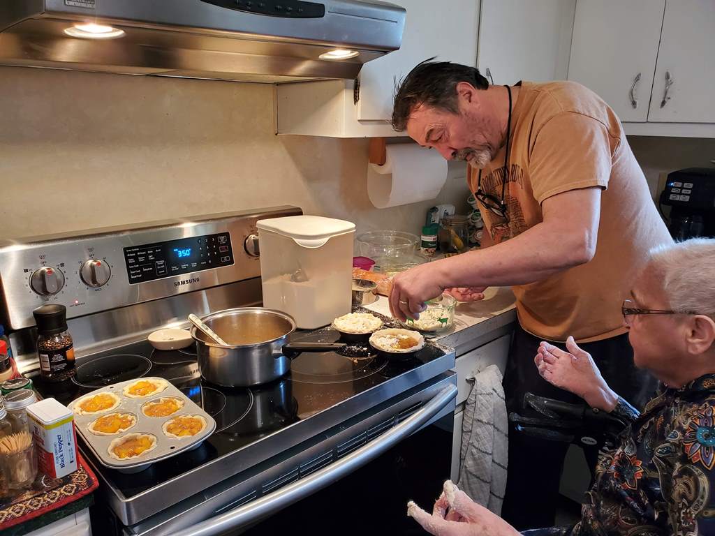 January 2021, mom and John cooking